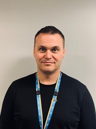 Headshot of Adam Kerswell