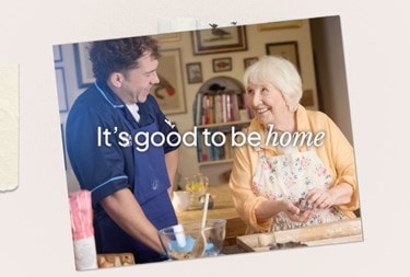 Carer and customer in the kitchen baking