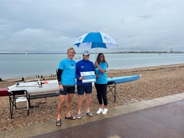 Receiving the baton from the manager from Fareham