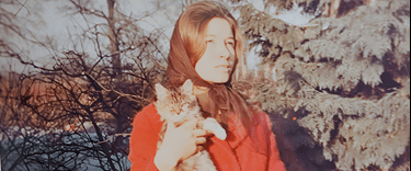 Lady holding her pet cat