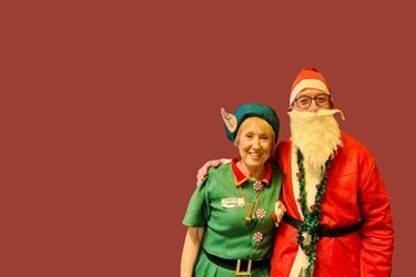 Care Experts dressed as an Elf and Santa