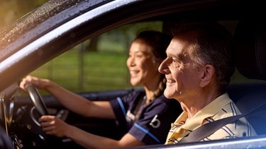 male customer and carer in car