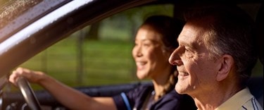 male customer and carer in car