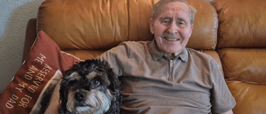 Ian and his cavapoo, Teddy