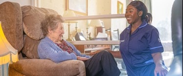 Carer looking after an elderly patient