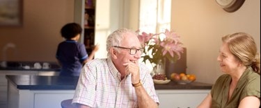 male customer and relative in kitchen
