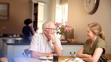 male customer and relative in kitchen