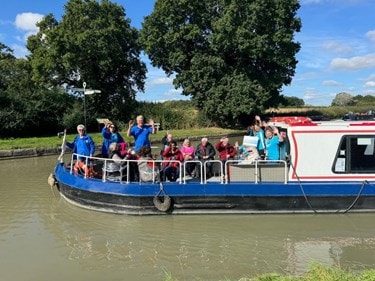 Image of Bluebird Care team on a barge