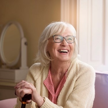 Elderly Female Customer Smiling