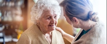Carer looking after an elderly patient