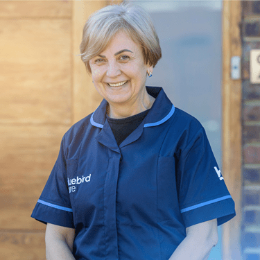 Carer outside customer house