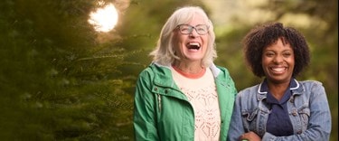 Care Expert and female customer walking outside