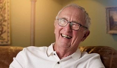 Male customer laughing