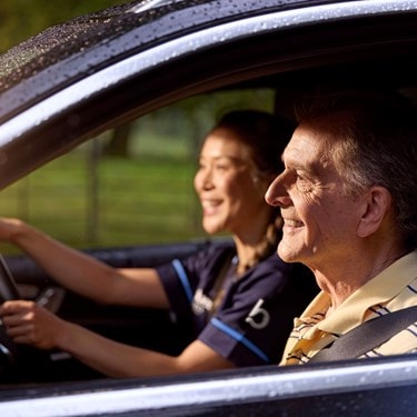 male customer and carer in car