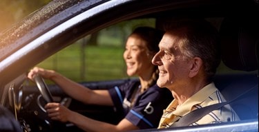 male customer and carer in car