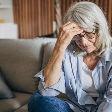 Elderly lady struggling to comprehend her thoughts