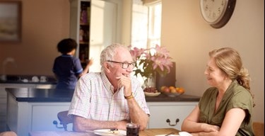 male customer and relative in kitchen