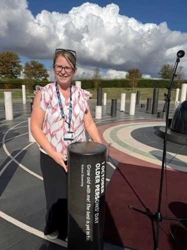 Gemma at the Rose, beside the monument to celebrate International Day of Older Persons