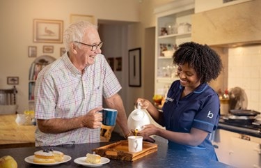 Customer and Care Expert drinking tea