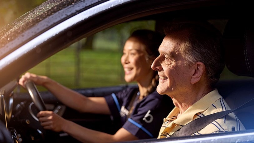 male customer and carer in car