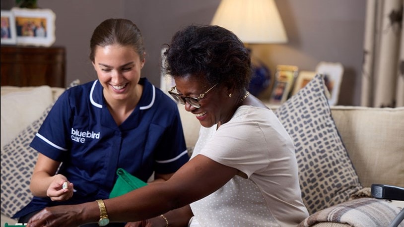 care expert and female customer playing scrabble