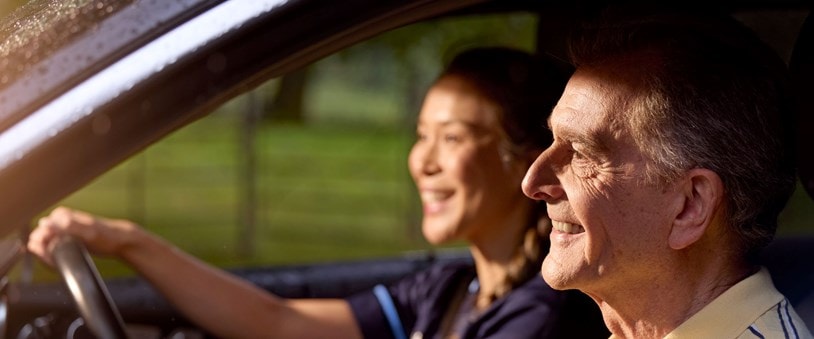 male customer and carer in car