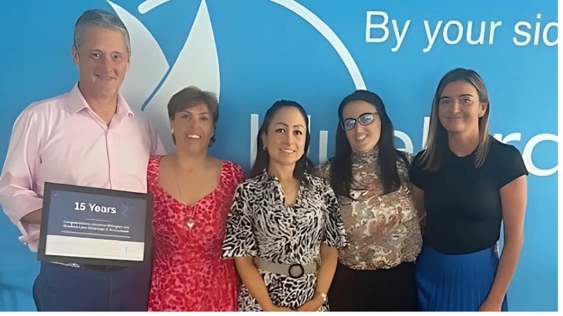 Bluebird Care Elmbridge Team celebrating 15 years