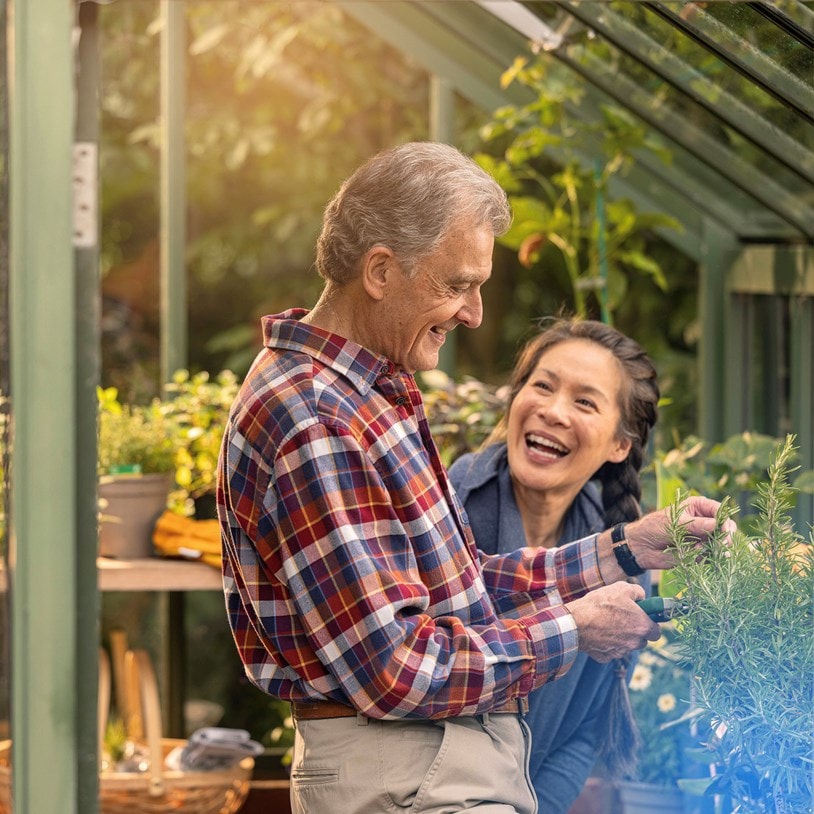 male customer and carer in greenhouse