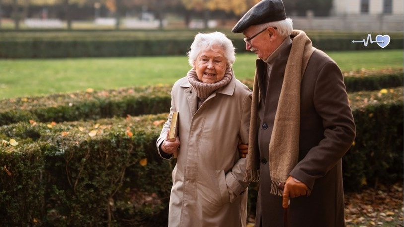 elderly couple walking together to encourage a healthy heart