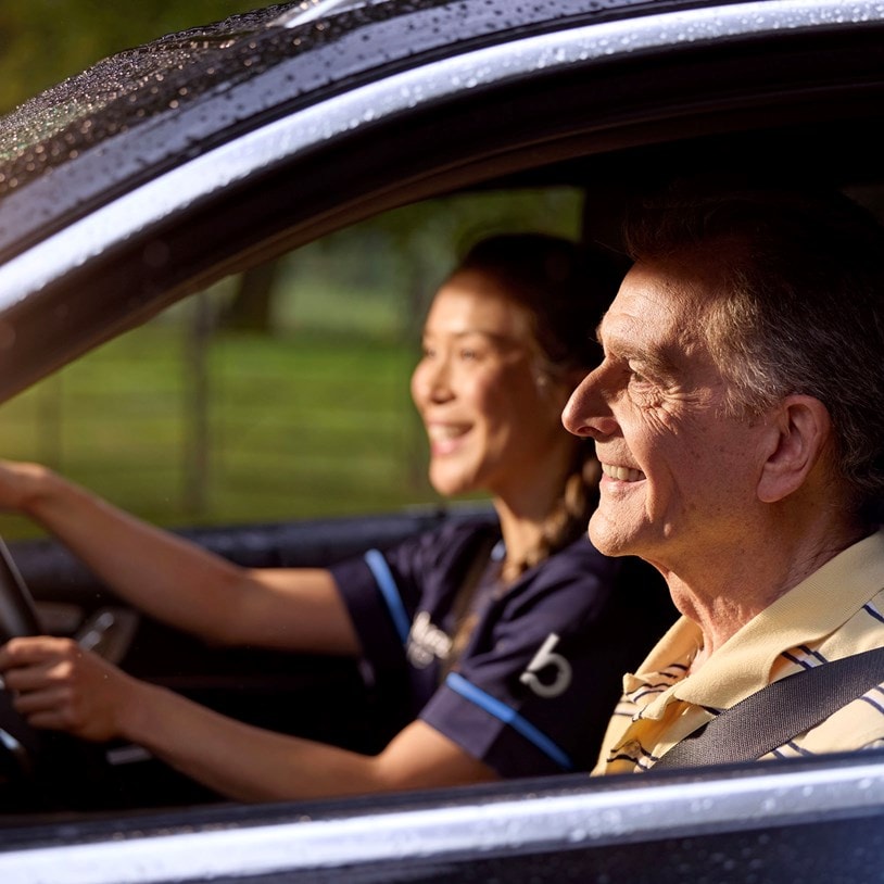 male customer and carer in car