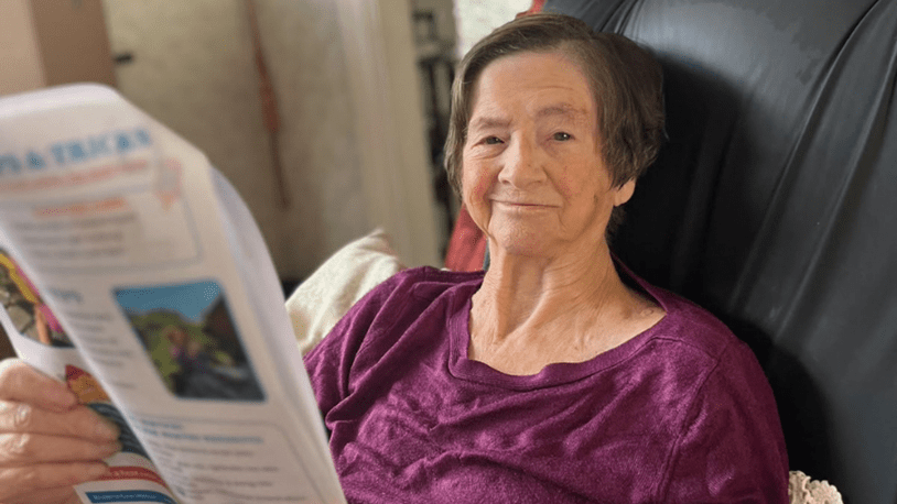 Bluebird Care Merton customer reading