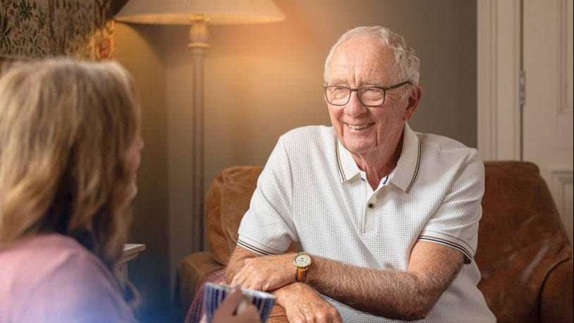Elderly Man chatting to a lady