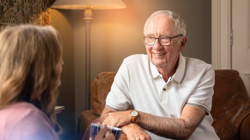 Elderly Man chatting to a lady